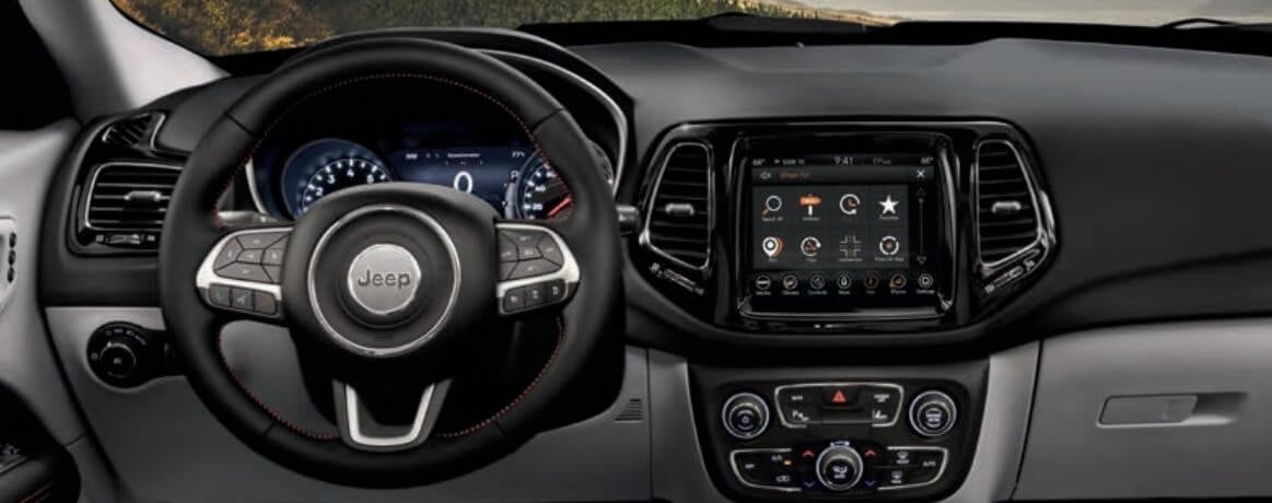 Jeep Compass vs Nissan Rogue Clarkston MI
